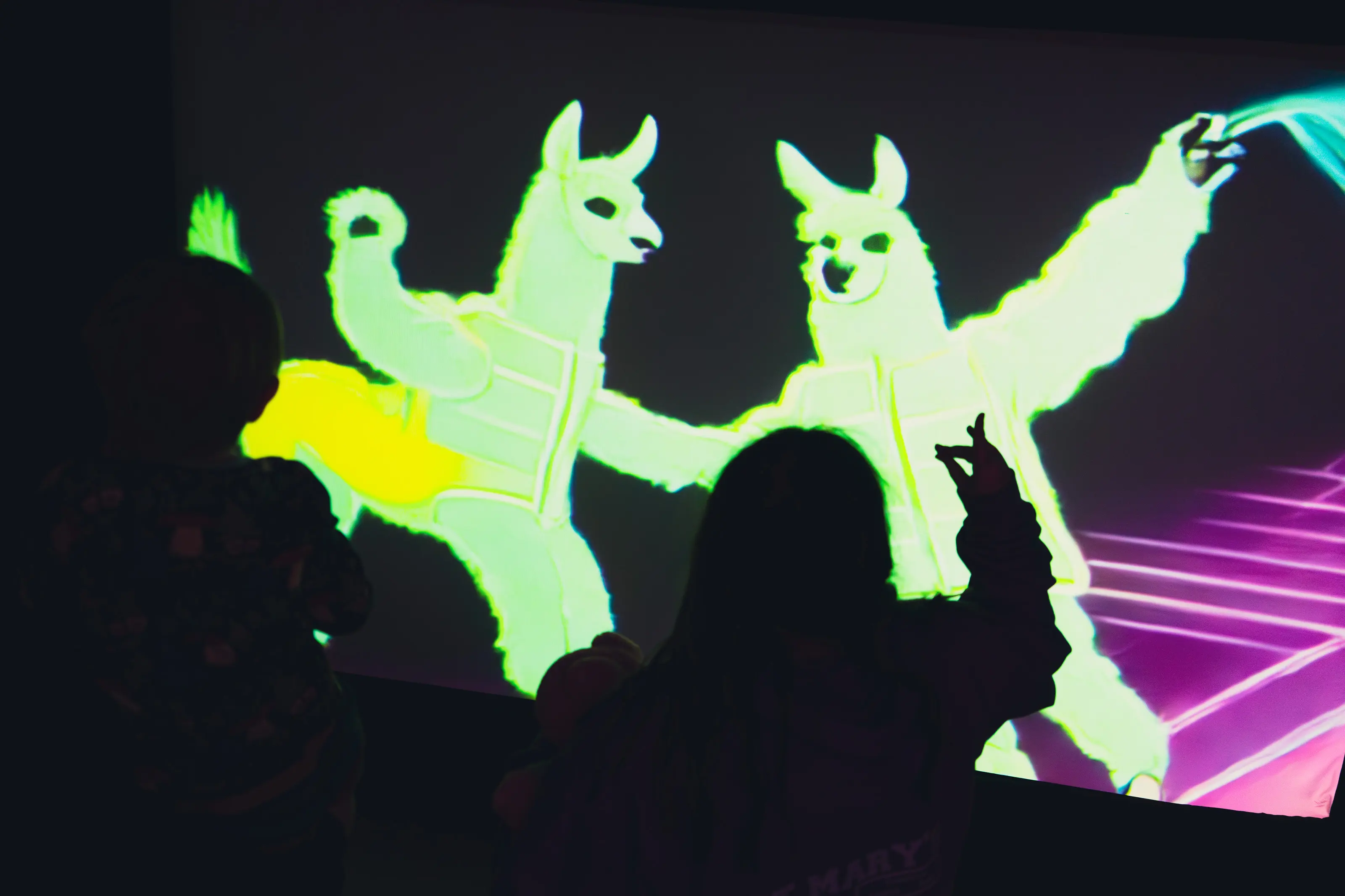 Children playing with responsive digital system